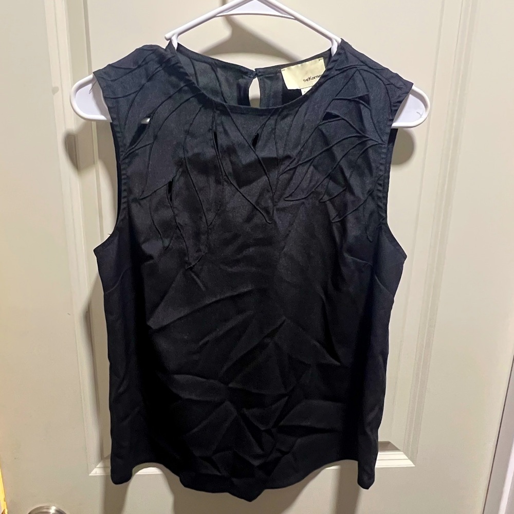 The Korner black sleeveless blouse